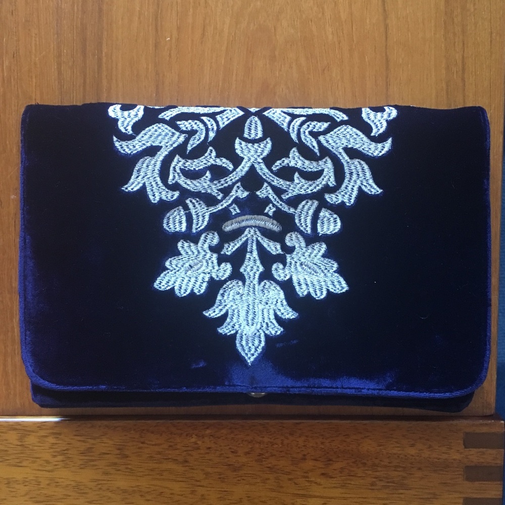 Blue velvet clutch with white embroidery!